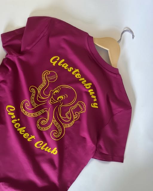 Glastonbury Cricket Club top with a large yellow octopus print