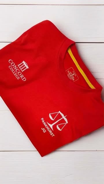 Red printed Concord College Pankhurst house T-shirt photographed by NX Teamwear